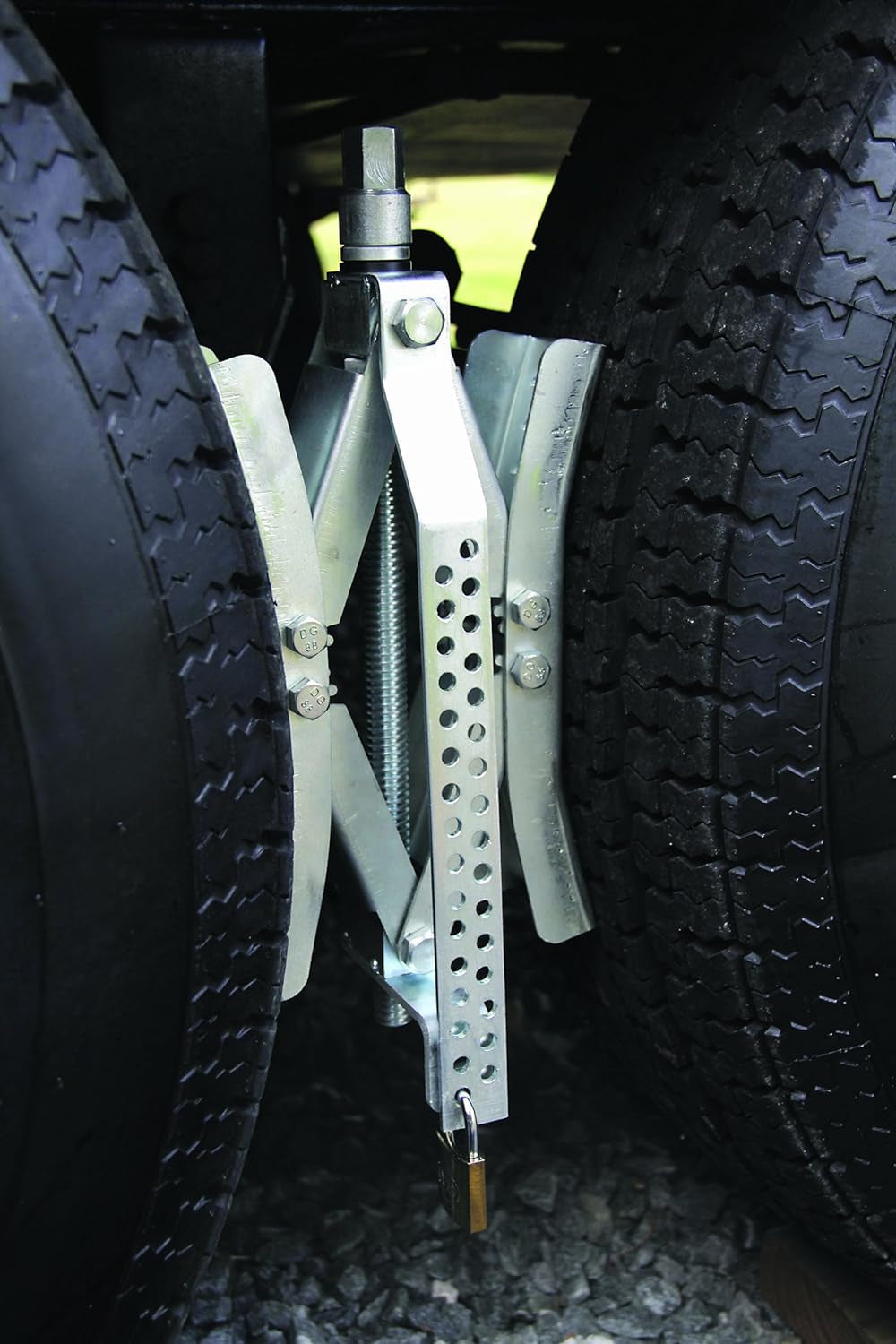 IMMOBILISATEUR DE ROUES POUR REMORQUE TANDEM - 910